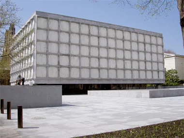 Yale’s Beinecke Library: a building with translucent white-marble “windows” that gently filter-in light so the books inside are protected