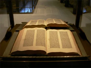 An original Gutenberg Bible from 1454, displayed in a glass case at Yale's Beinecke Library