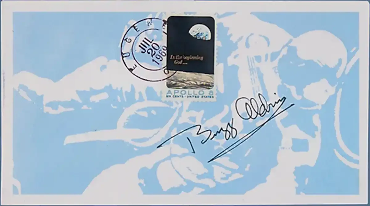An envelope with Buzz Aldrin's signature, postmarked July 20, 1969, in Eugene, Oregon
