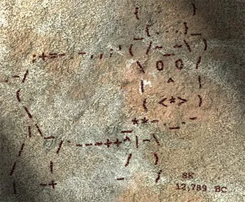 An ASCII-art buffalo on the wall of a cave. The initials “SK” and the date “12,789 BC” are inscribed at lower right.
