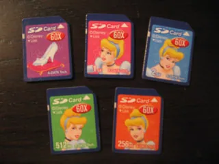 Refrigerator magnets shaped like SD cards with Disney characters on them