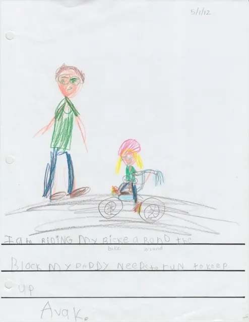 A child's drawing of herself on a bike with her dad nearby. Underneath she has written, “I am riding my bike around the block. My daddy needed to run to keep up.”