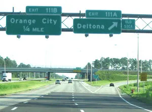 Highway exit signs numbered 111A and 111B