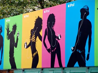 An iPod billboard-style advertisement, with silhouettes of youthful, stylish people