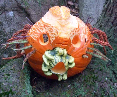 A pumpkin carved like a medusa head