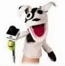 The Pets.com sock puppet holding a microphone